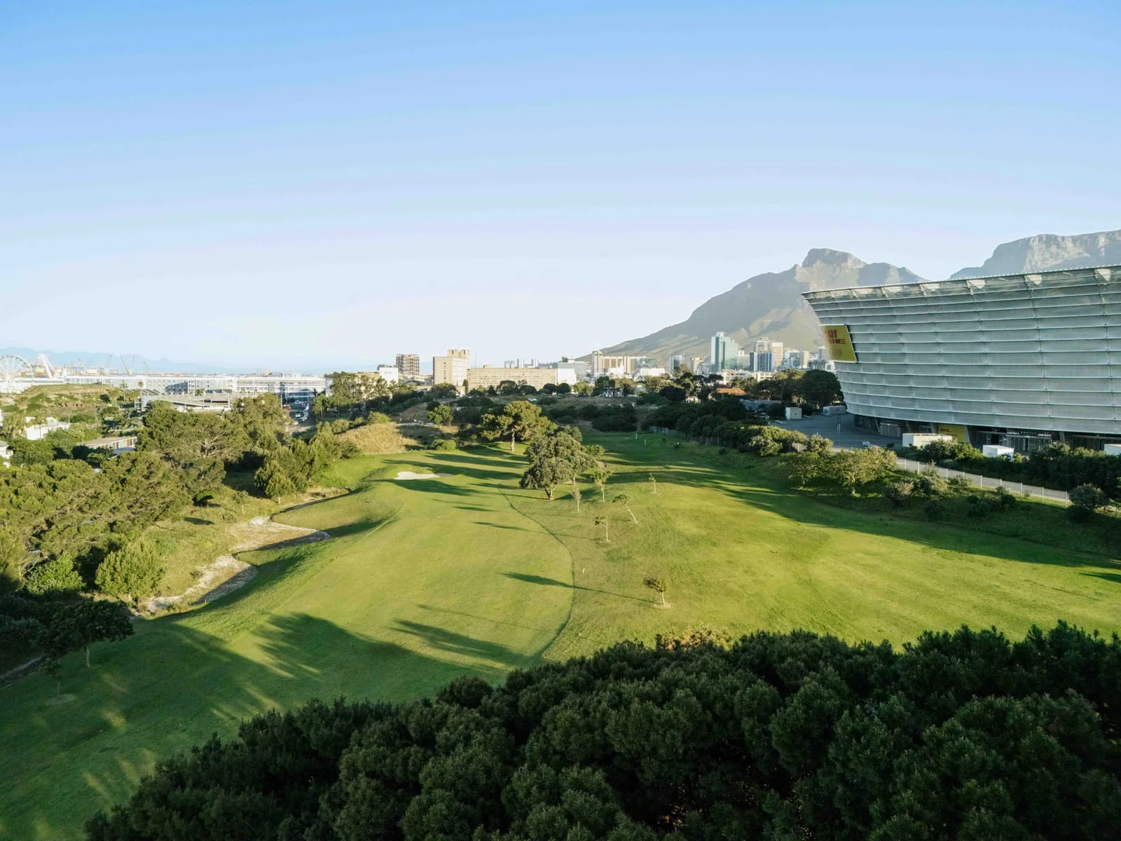 A broad fairway, with the stadium and Devil's Peak to the right